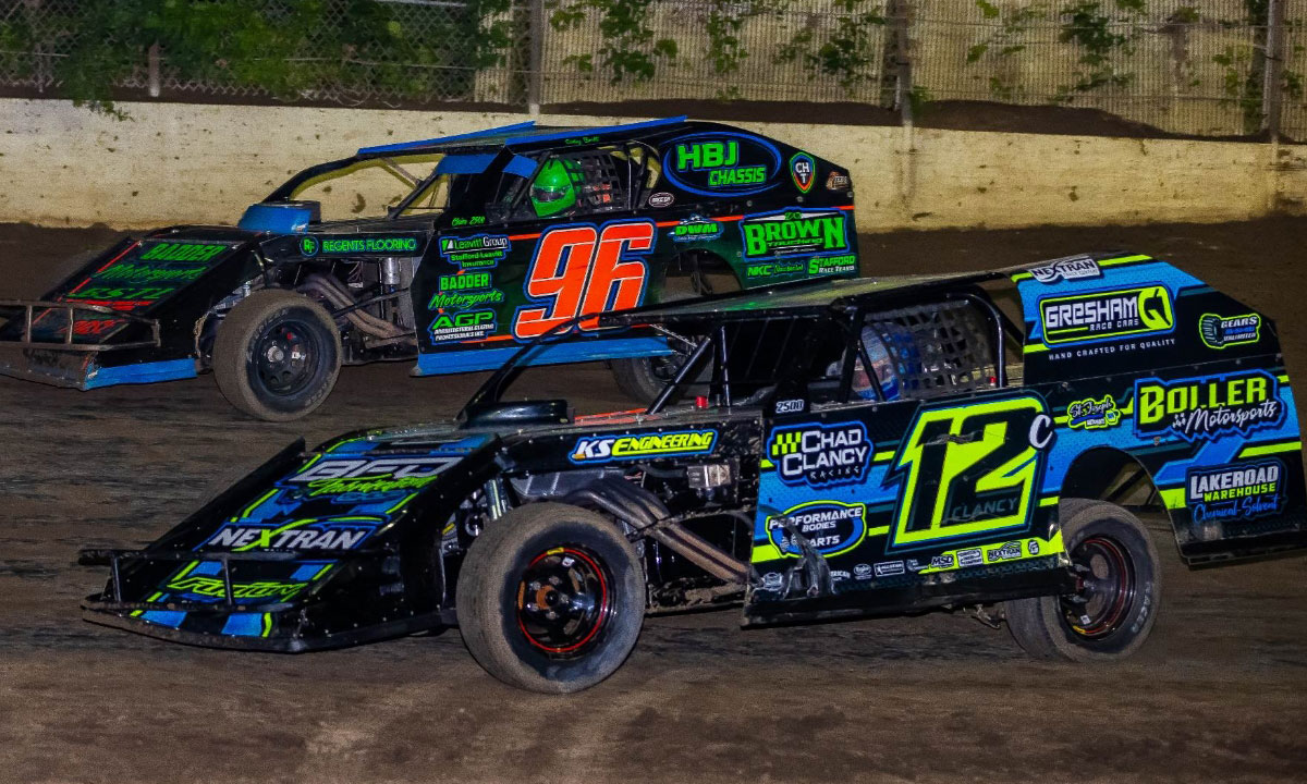 Stephen Clancy (12C) and Cody Brill (96) battle for the B-Mod victory Saturday night. (Josh Allee Photo)